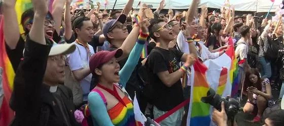 LGBTQ+ people celebrating the legalization of same-sex marriage in Taiwan.