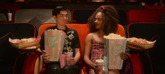 Transgender actress Yasmin Finney and William Gao cinema with popcorn Heartstopper season 2.