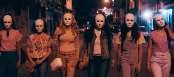 Gang of Christian women hanging out int he streets with masks in Medusa by Anita Rocha da Silveira.