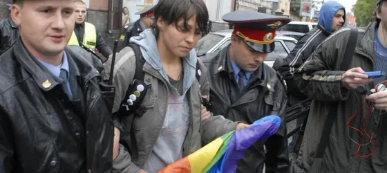 Gay rights activists arrested during a gay pride march.