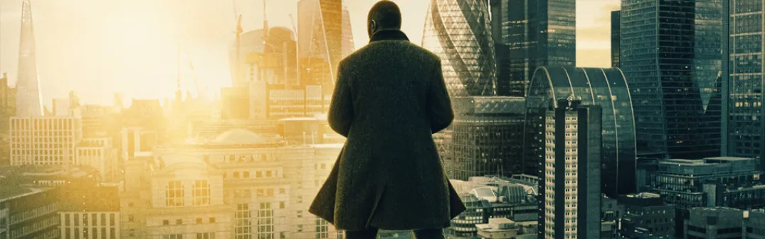 Luther: Fallen Sun movie poster showing John Luther on a top of a building looking at London.