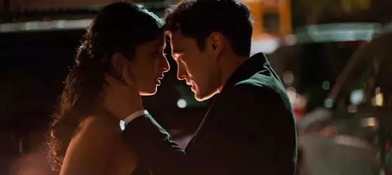 Devi Vishwakumar and Paxton Hall Yoshida kissing in the final episode of season 2.