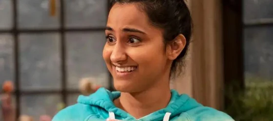 Amrit Kaur as Bela Malhotra.